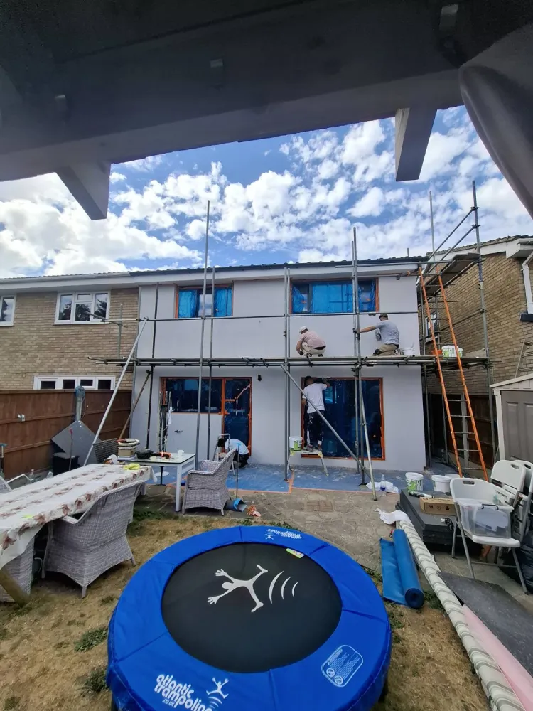 Silicone render being applied to the rear of a London home
